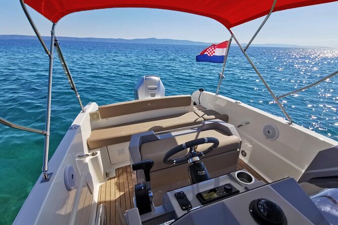 4h Small group boat tour to Blue cave and sandy beach with drinks - Stop 2: Three Green Caves swims, from easy to tight passages