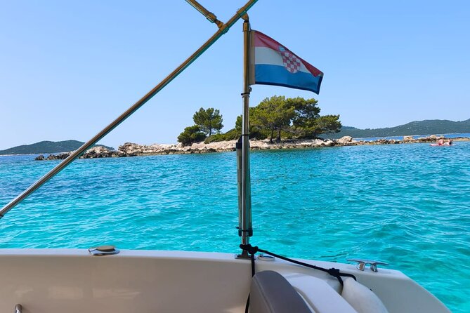 BLUE CAVE & ELAPHITI ISLANDS 4 HOURS ALL INCLUSIVE boat tour - Šunj Beach: real sand time (and a calm break)