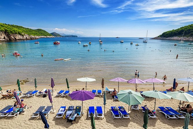 Blue Cave Premium Half-Day Tour with Panoramic Old Town View - Šunj Beach: the sandy reset after the caves (and where drinks fit in)