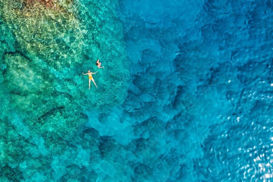 Dubrovnik: Blue & Green Caves Private Boat Tour with Drinks - Stop 1: Blue Cave on Koločep Island (the star swim)