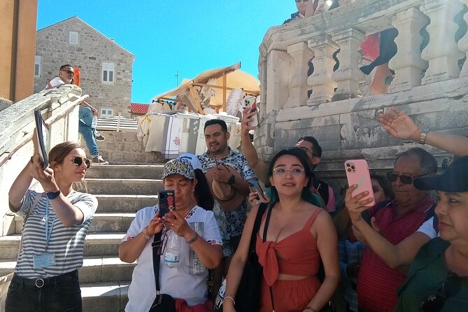 Dubrovnik City Tour: Panorama Drive & Sightseeing Walk - Driving the wall edges: Buža Gate and the north side perspective