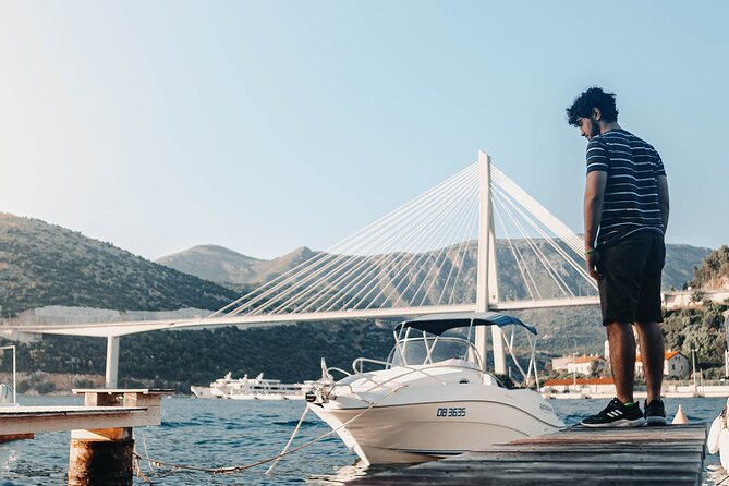 Dubrovnik Hidden Bays and Promenade Segway Guided Tour - Coral Beach Club and island views above the sand