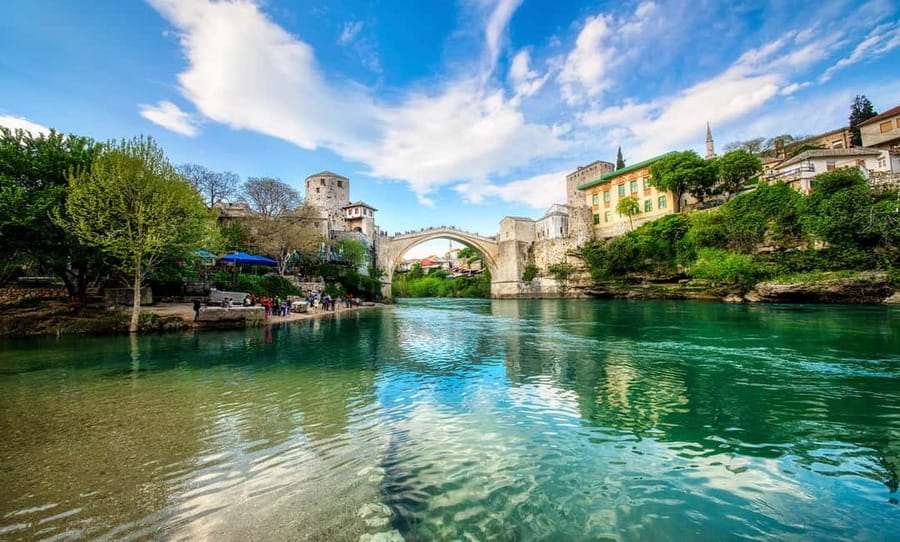 Dubrovnik: Mostar & Kravica Waterfalls Day Trip - Mostar’s Old Bridge and the local guide walk