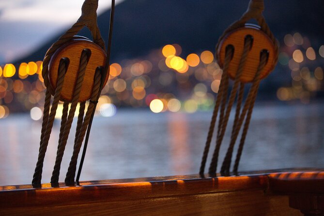 Dubrovnik Panoramic Night Cruise with Karaka - Gliding into port: the panoramic city lights finale