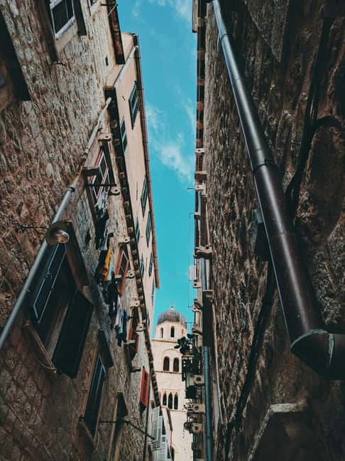 Dubrovnik: Private History Walk Through the Old Town - Stradun: the spine of trade, politics, religion, and daily life