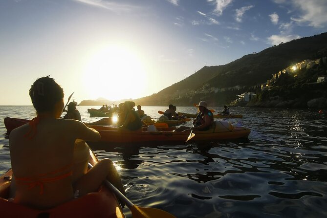 Dubrovnik: Sunset Kayak & Snorkel Tour with Wine & Water - Lokrum Island Passing and Full Circle When Conditions Allow