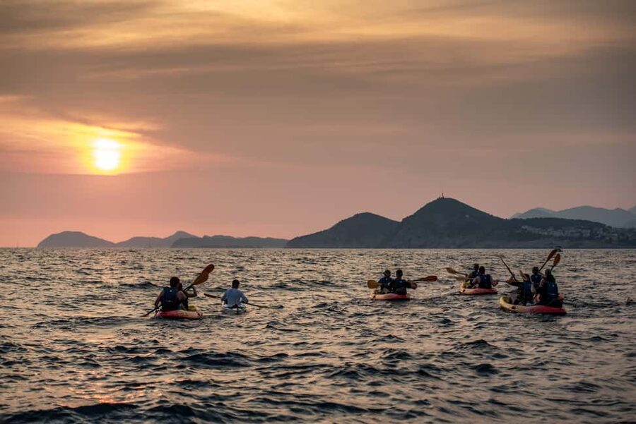 Dubrovnik: Sunset Kayaking and Snorkeling Tour - Betina Cave snorkeling: clear water, short stop, and good rules