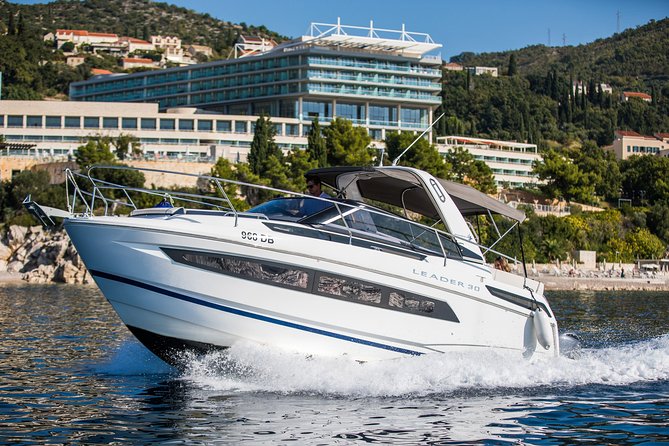 Explore the Caves and Hidden Bays with Underwater Scooter - Getting on board: pickup, boat comfort, and included drinks