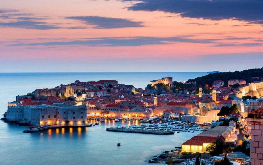 From Dubrovnik: Golden Hour Sunset Cruise with Free Drinks - Getting on Board at Old Town Harbor (and what to bring)
