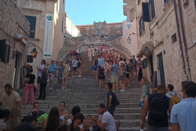 History Walking Tour: Charm of Old Dubrovnik - Franciscan Church and Monastery: a small square with big layers