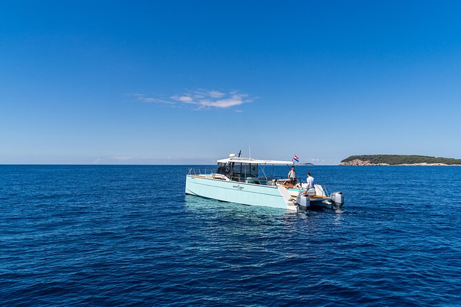 Luxury Blue Cave and Elaphiti Islands Small Group Tour - Šunj Beach on Lopud: The Long Sandy Stop (and the Swim-In Landing)