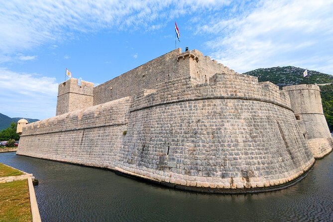 Private Full Day Peljesac Wine Tasting Tour from Dubrovnik - Stop in Ston: walls, salt pans, and a quick food-choice window