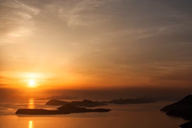 Sunset Catamaran Tour from Old Town Dubrovnik - Key highlights you’ll feel immediately